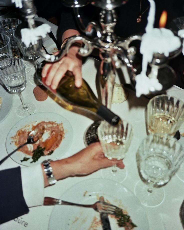 Guests toasting with champagne at an evening gathering